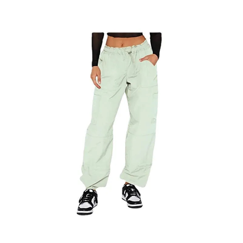 Men's loose-fit straight-leg cargo trousers with multiple utility pockets in a neutral colour.
