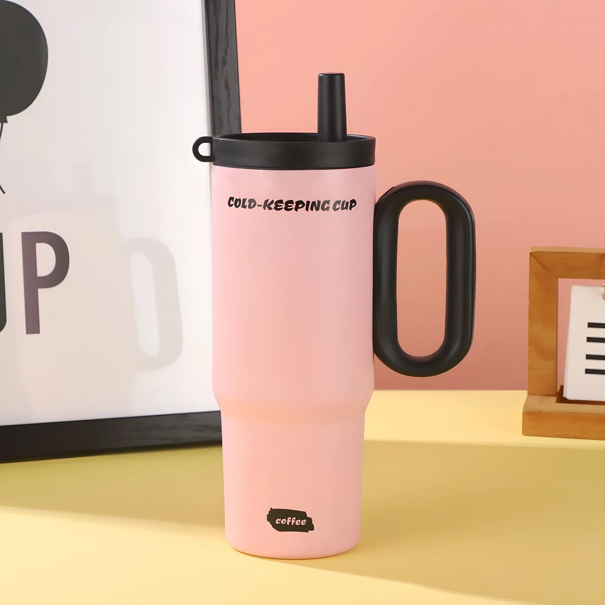 Large 700ml straw cup with a carry handle in assorted colours.