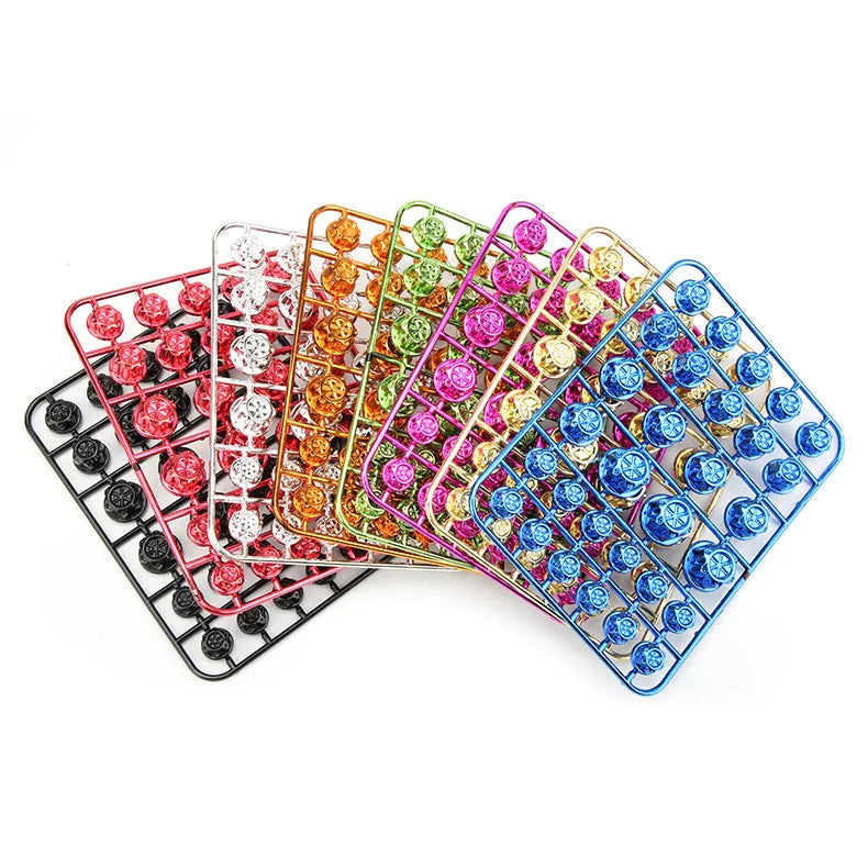 Set of 30 coloured motorcycle engine screw caps in black, red, gold, blue, silver, green, orange, and purple.