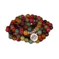 Close-up of a 108-bead alloy bracelet with a multi-layer lotus string design in a tourmaline colour.