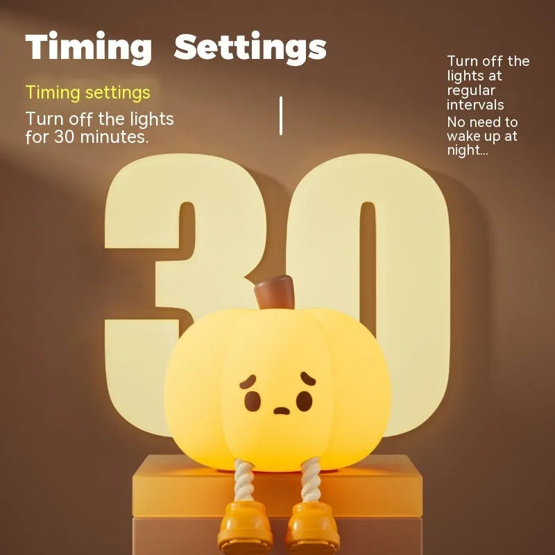 Soft silicone pumpkin-shaped night light with warm yellow glow