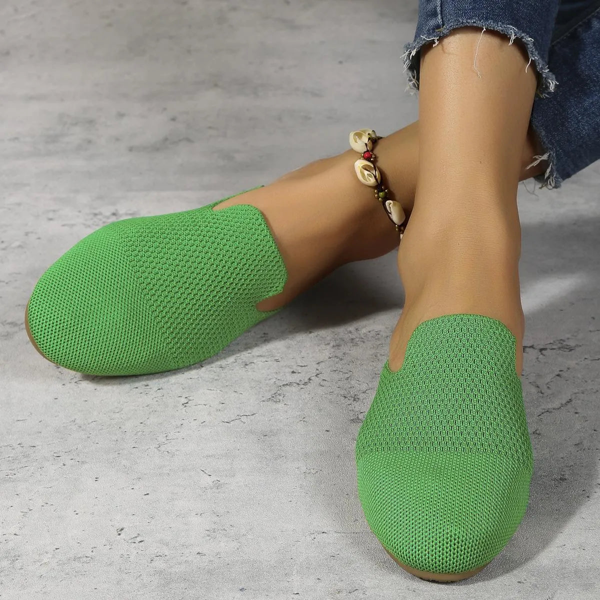 Casual mesh slip-on sandals in apricot, blue, and green colours with round toe and rubber sole.