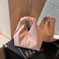 Women's casual PU leather dumpling-shaped handbag in multiple colours with internal organiser pockets.
