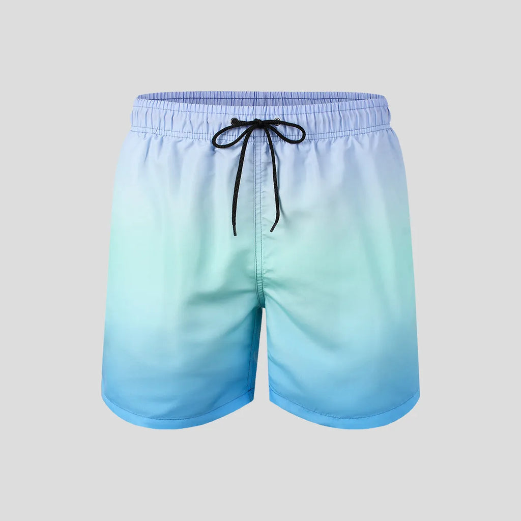 Man wearing gradient colour 3D digitally printed mesh sports shorts.