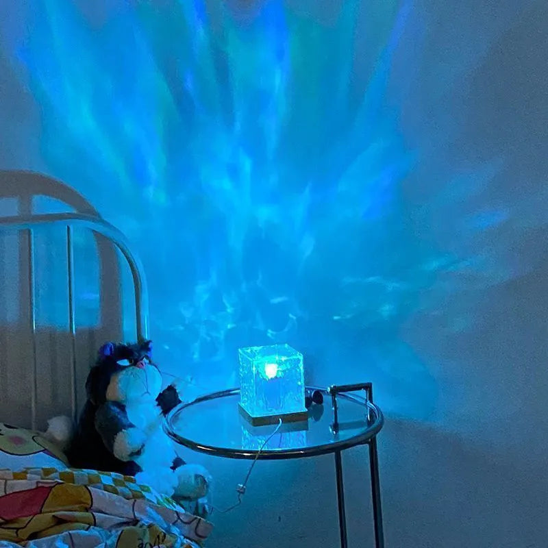 Geometric LED water ripple night light with remote control projecting colourful rotating patterns