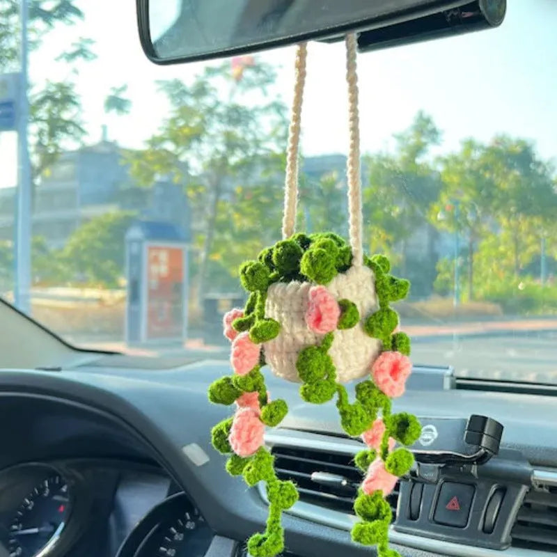 Green and white knitted wool car plant decoration with 8cm base and 25cm hanging rope
