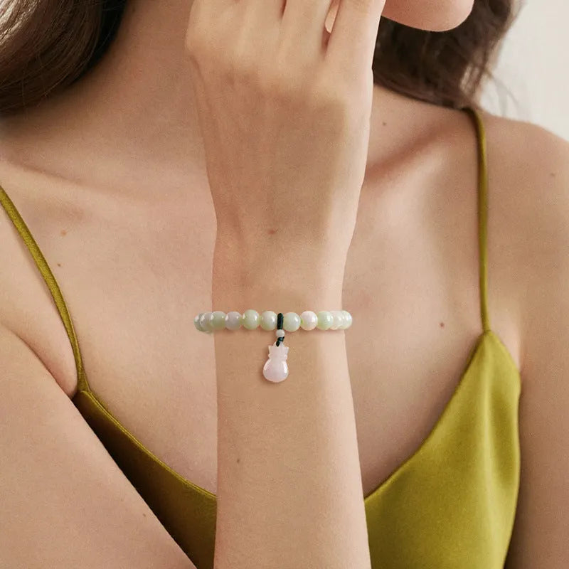 Jade flower bracelet with 8mm diameter floral centrepiece and adjustable unisex fastening