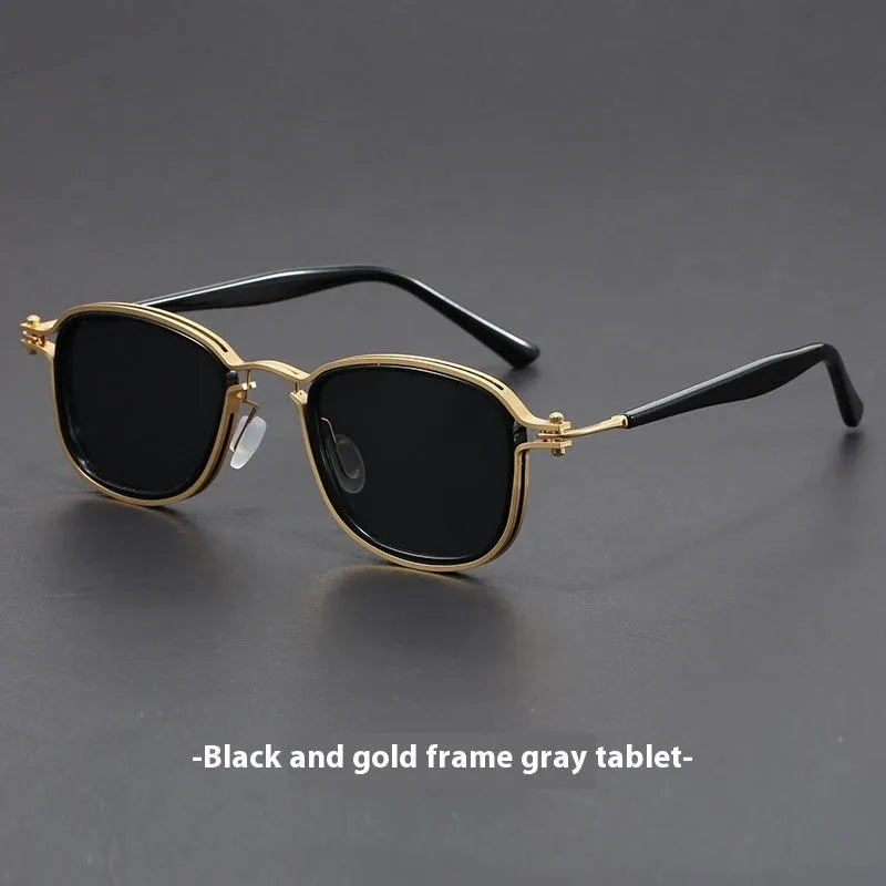 Retro square frame sunglasses with AC lenses in a Black Gold Full Gray colour finish.