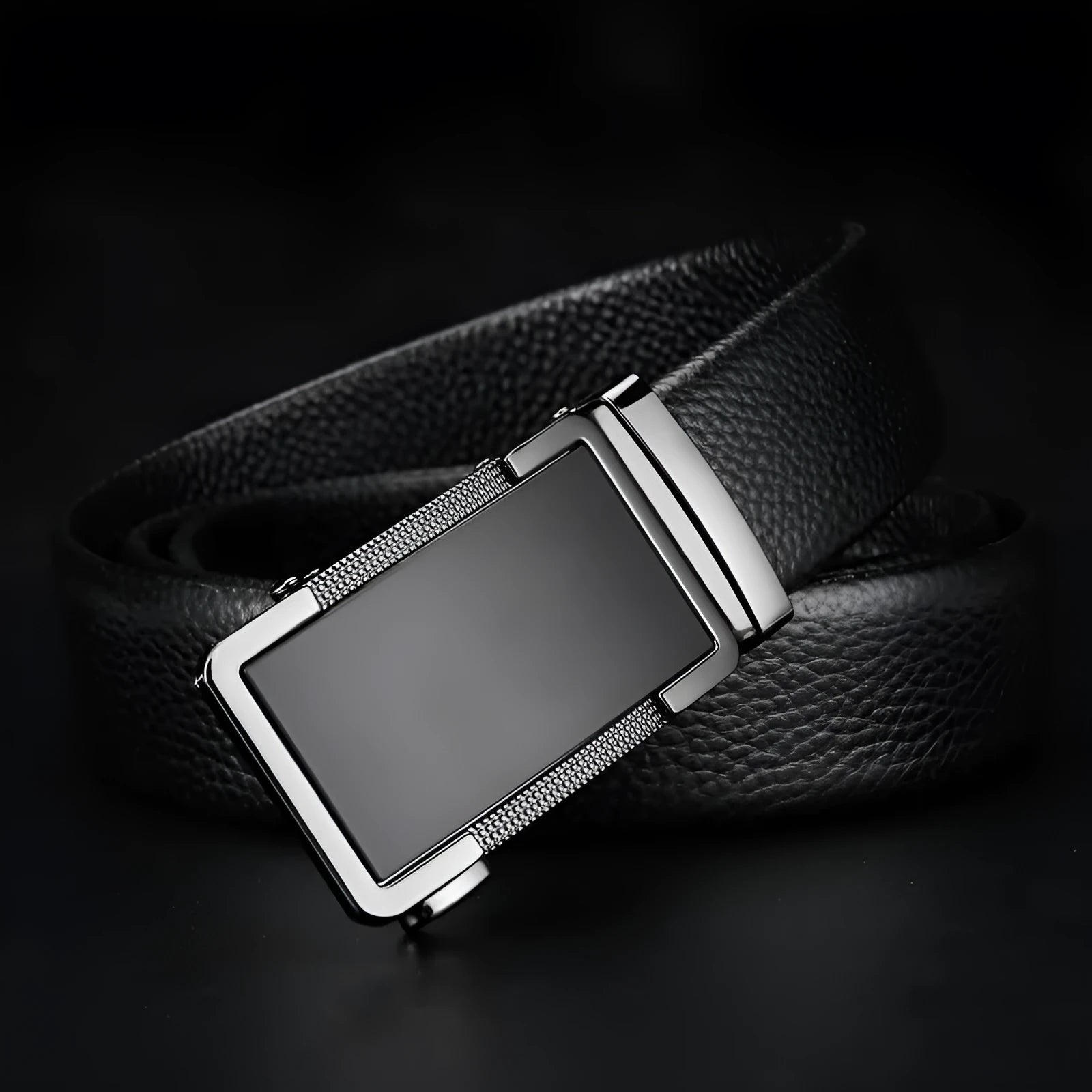 Men's gun black leather belt with a silver automatic comfort click buckle fastened.