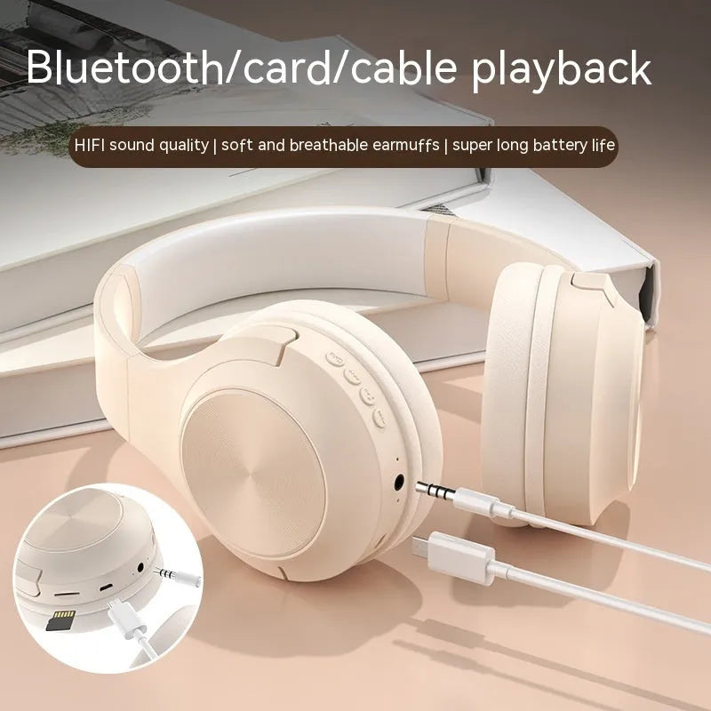 Creative head-mounted wireless Bluetooth headset in Ivory White colour on a charging bin.