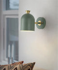 Single-head aluminium wall lamp in a choice of blue, green, pink, or yellow colours.