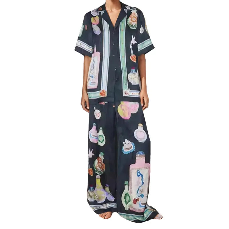 Black women's casual set with cartoon pattern featuring cardigan top and trousers