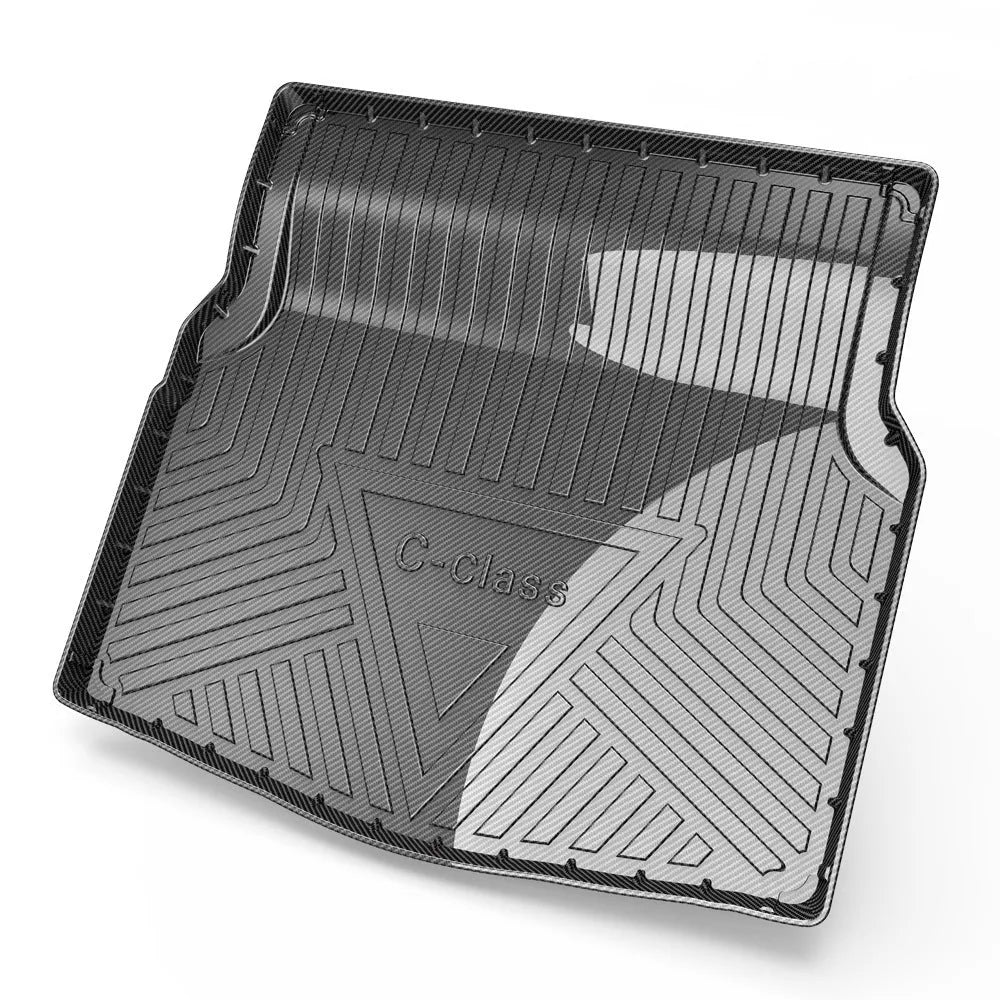 Black car boot protective mat with carbon fiber texture pattern, made from TPO+TPV material.