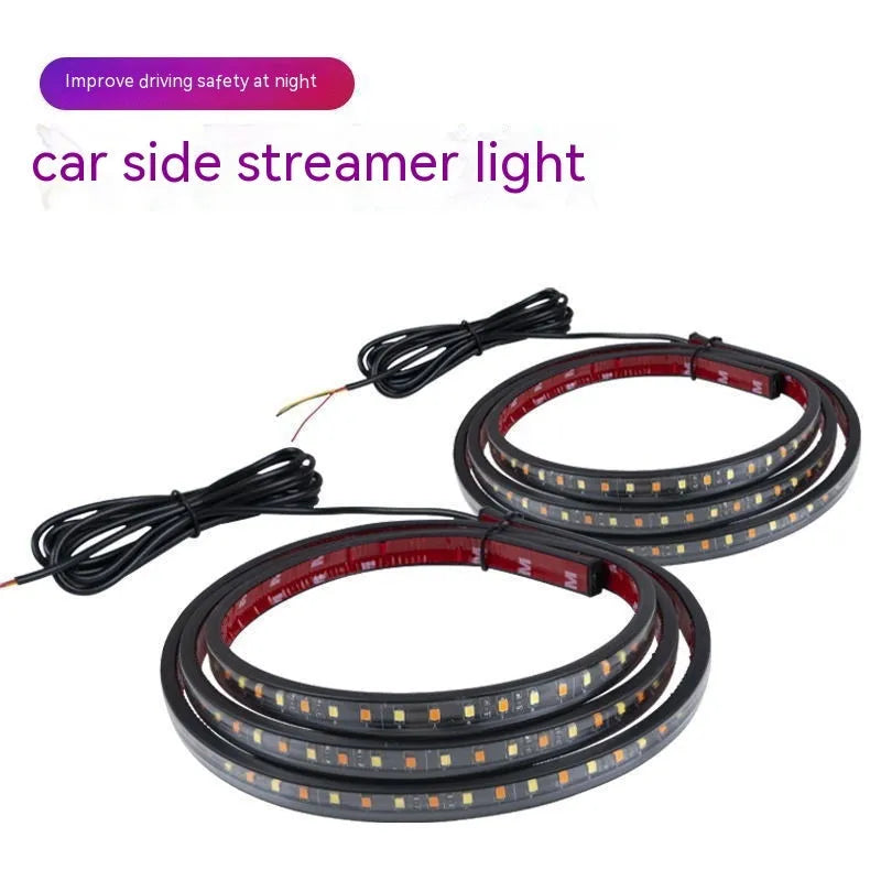 Pedal Streamer bicycle side steering yellow light lamp with long white-yellow PVC streamer on wheel.