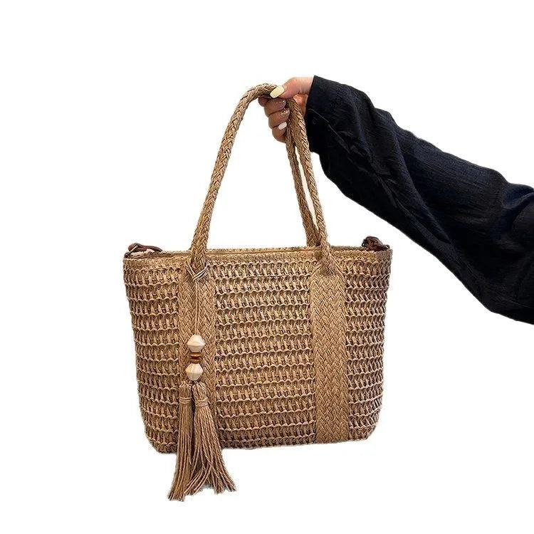 Women's woven straw crossbody bag in milky white with polyester lining and shoulder strap