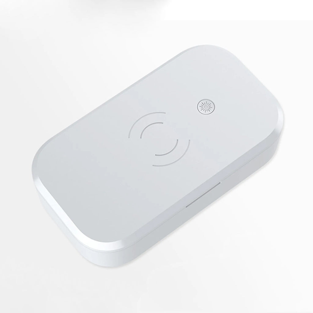 White ultraviolet disinfection box with wireless phone charging function on top.