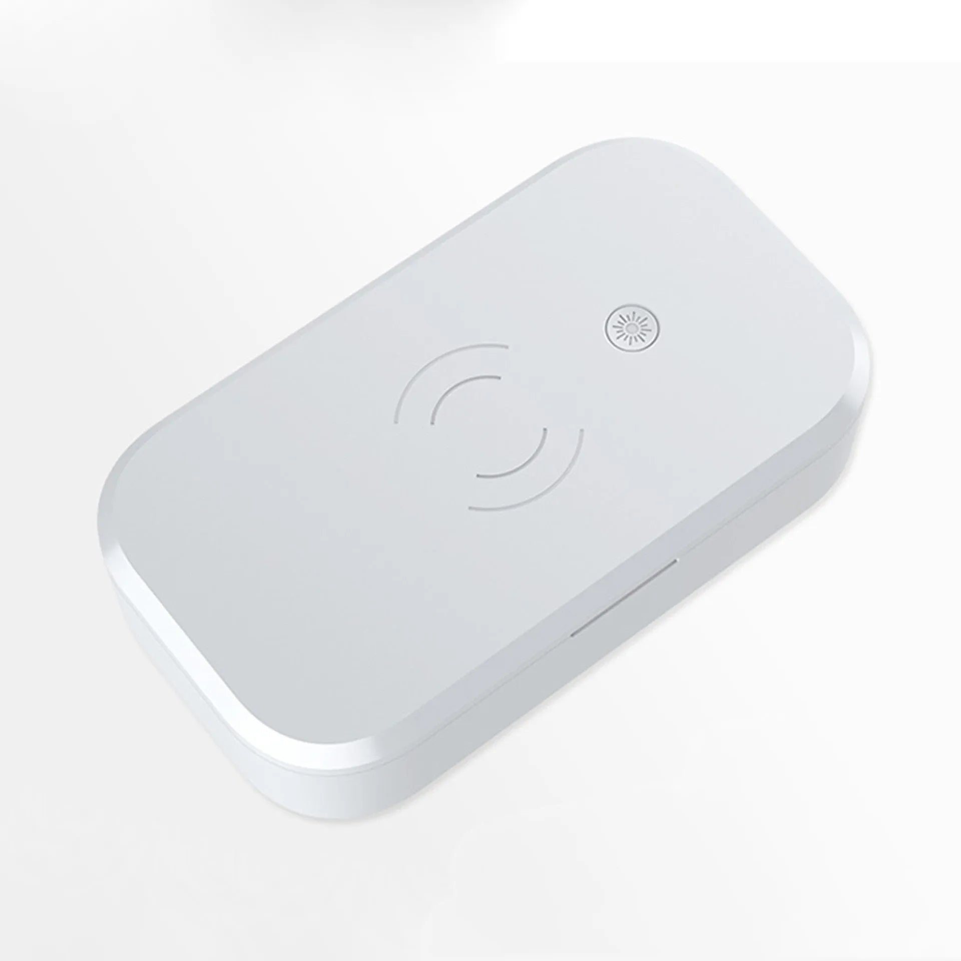 White ultraviolet disinfection box with wireless phone charging function on top.
