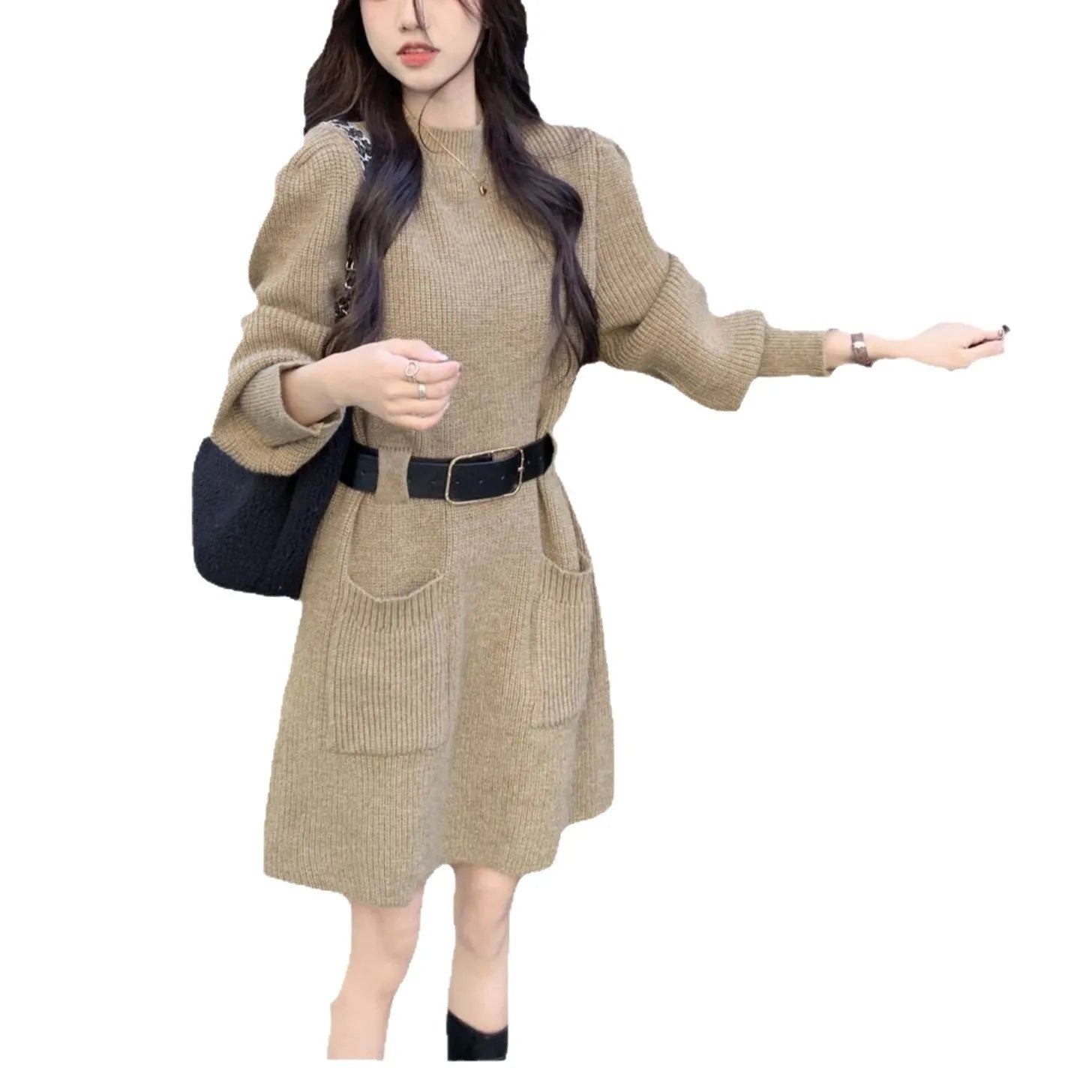 Long sleeve high-waist knitted dress on a hanger with a black belt, shown in beige colour.