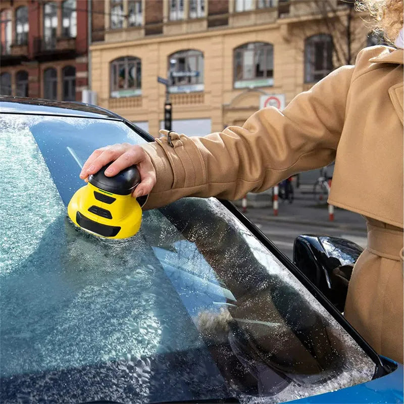 Yellow cordless electric ice scraper for car windows with USB charging cable