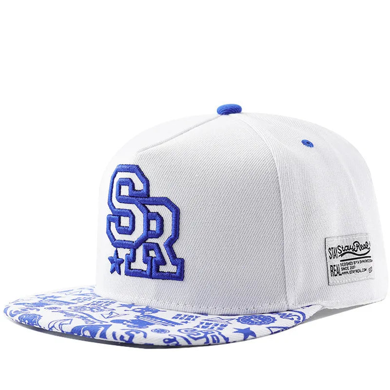 Cotton baseball hat with embroidered lettering in black colour showing adjustable strap