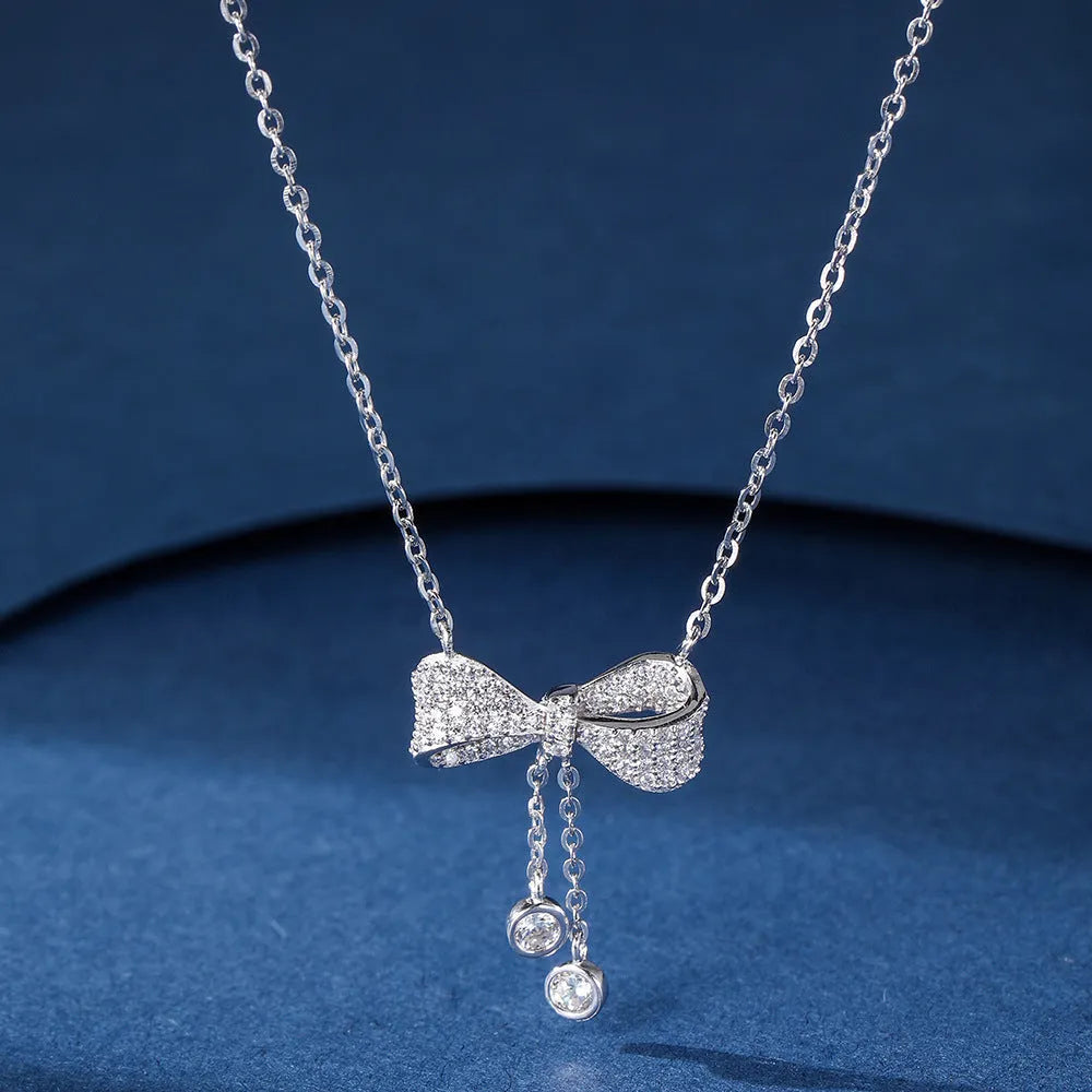 S925 sterling silver bow pendant necklace on O-ring chain with adjustable 40-45cm length