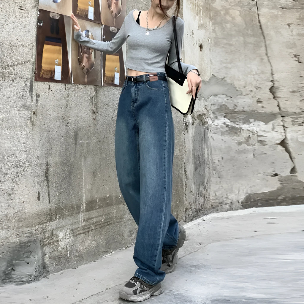 Women's high waist straight leg jeans in retro blue colour on a hanger.