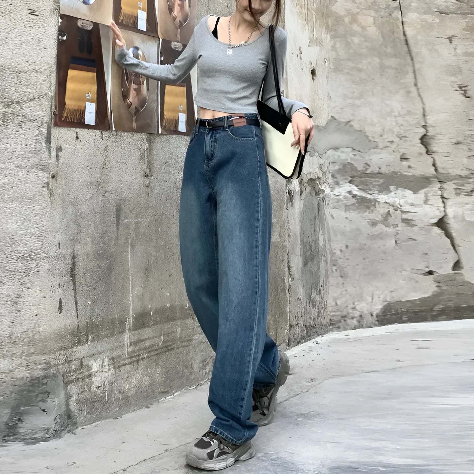 Women's high waist straight leg jeans in retro blue colour on a hanger.