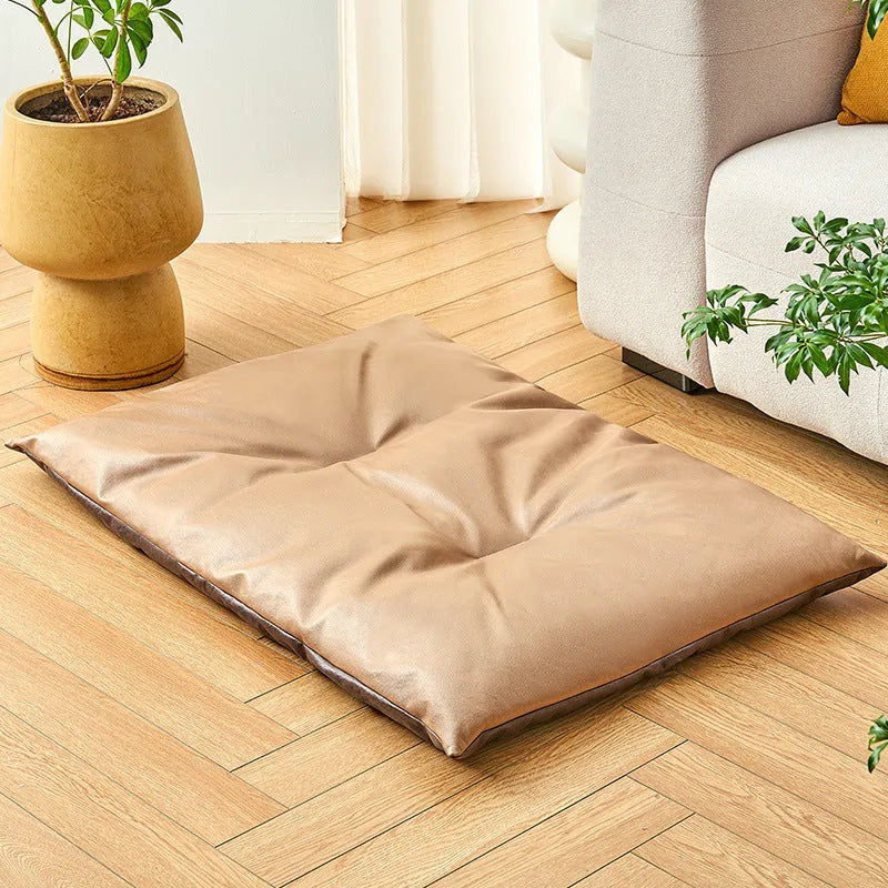 Blue and Coffee coloured pet sleeping mats shown in four different sizes for cats and dogs