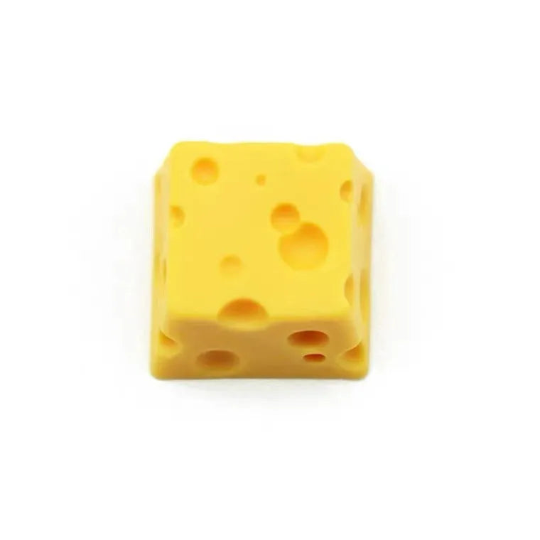 Solid yellow resin artisan key cap with detailed cheese design for MX mechanical keyboards.