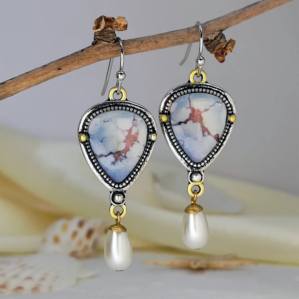 Retro blue electroplated drop earrings with geometric shape, synthetic blue opal and white pearl accents