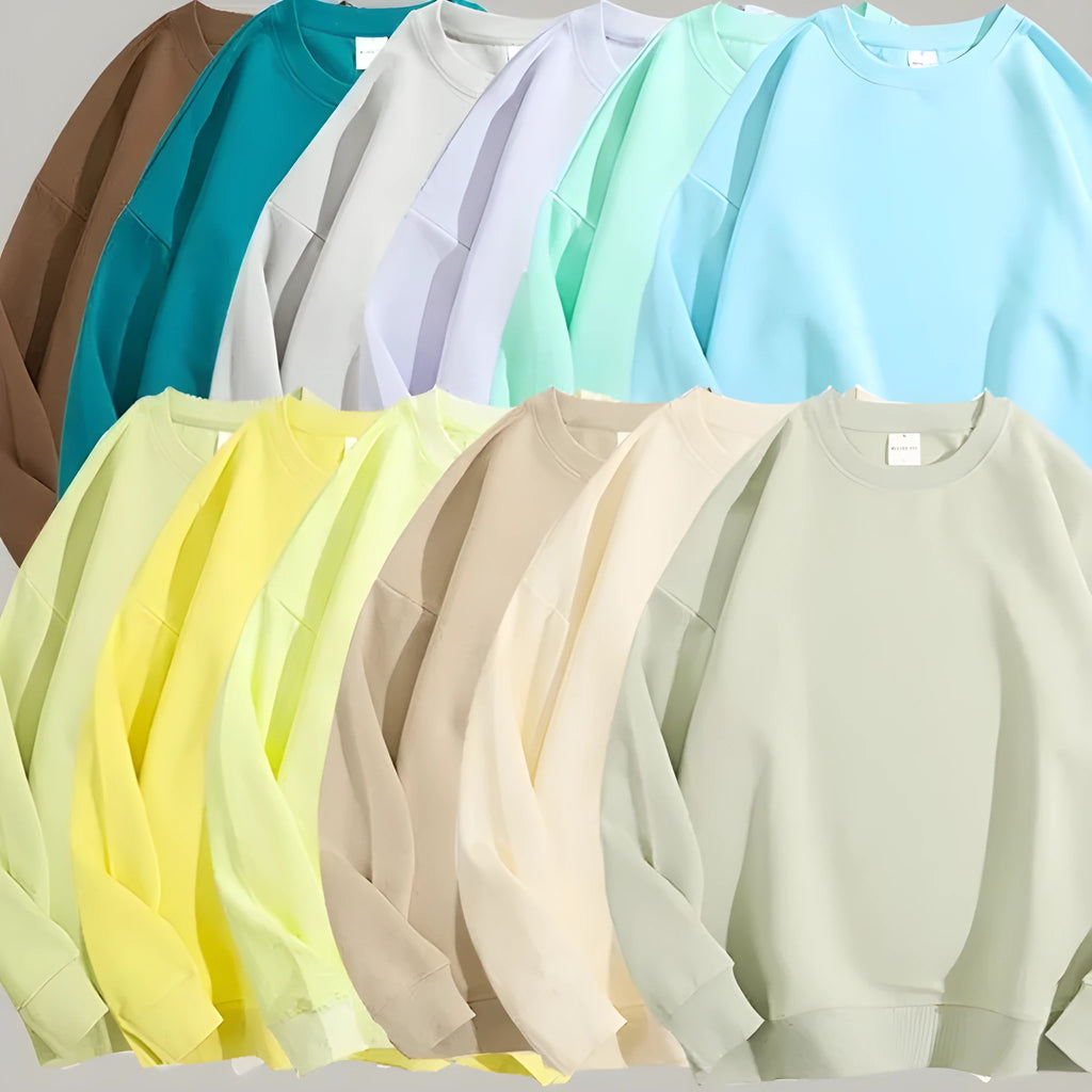 Women's loose fit cotton off shoulder sweater in a solid colour, showing round neck and long sleeves.