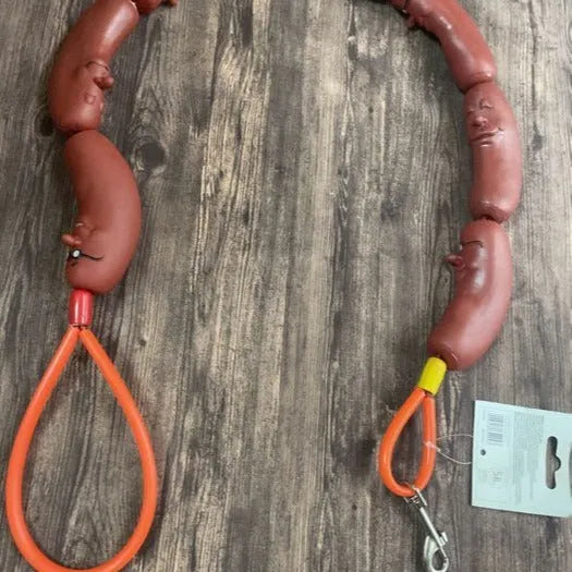 Brown sausage-style dog rope toy with hand grip tape, shown at full 108cm length
