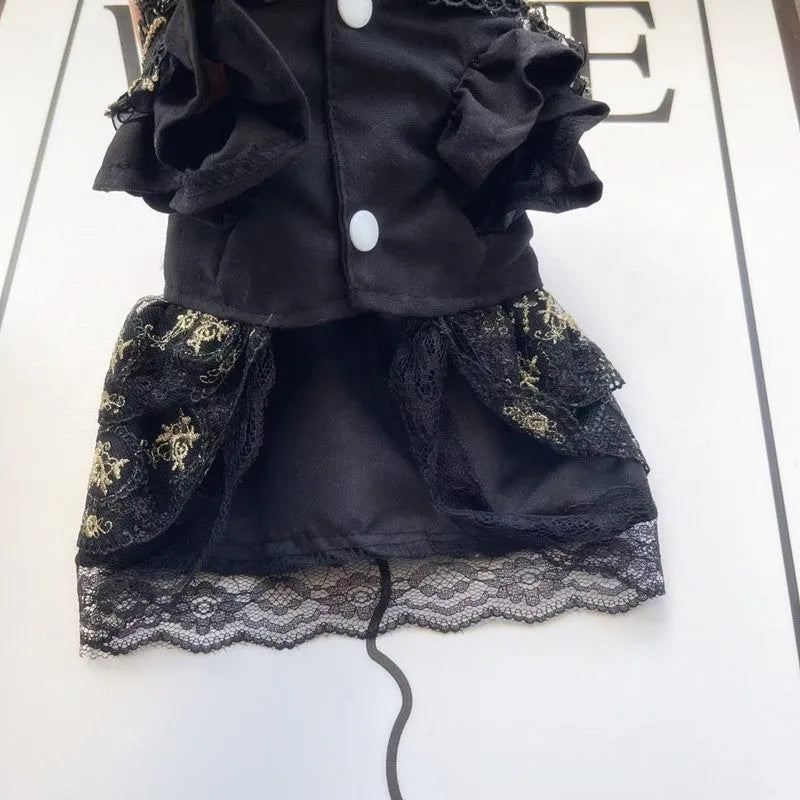 Golden Gothic princess-style skirt pet clothing for a small dog or cat on a mannequin.