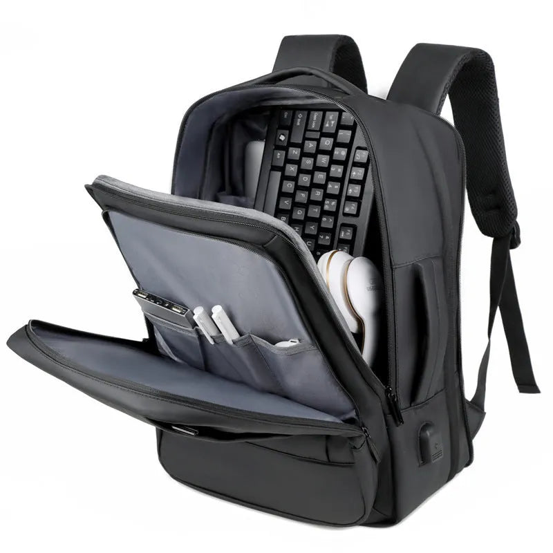 Black large capacity Oxford cloth men's backpack with curved shoulder strap, shown for business and travel use.