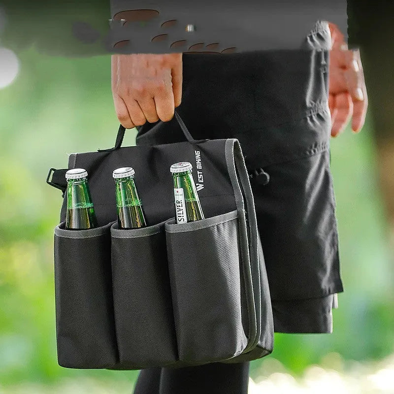 Black double-sided bicycle bag mounted on a bike carrier, showing two compartments.