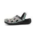 Black women's platform sandals with rhinestone detailing on EVA upper and sole.