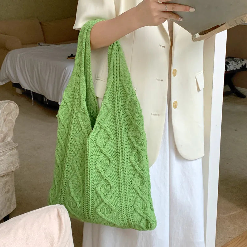 Retro hollow knitted women's shoulder tote bag in a solid colour with double straps.