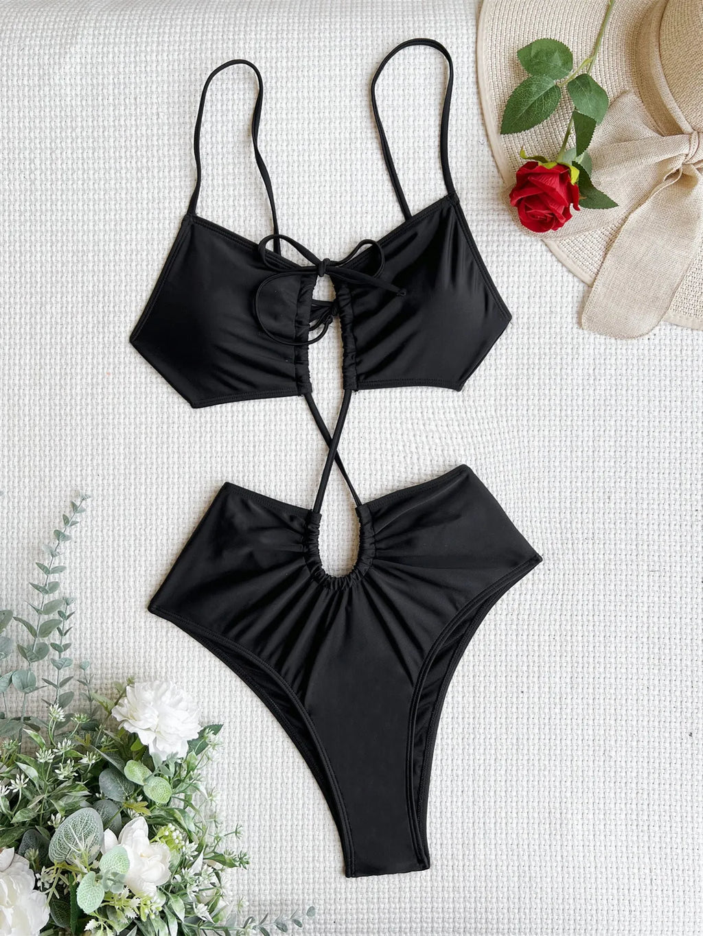 Women's sleeveless hollow-back one-piece swimsuit in black, green, and red colours