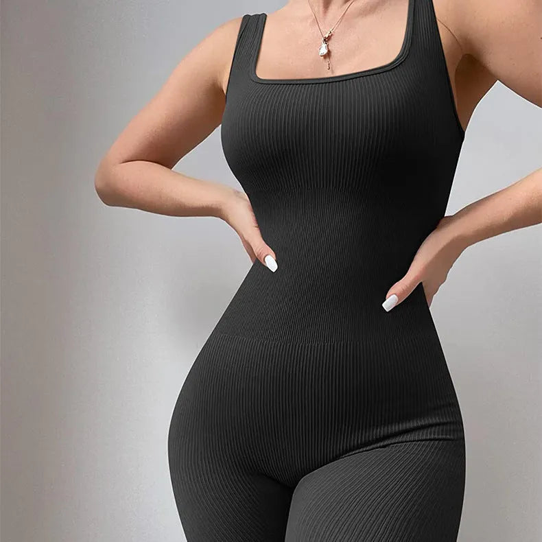 Women's long sleeve suspender tank top tights unitard in spandex, shown in a solid colour.