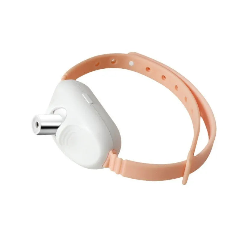Green and pink USB rechargeable laser cat collar with adjustable strap for automatic feline entertainment