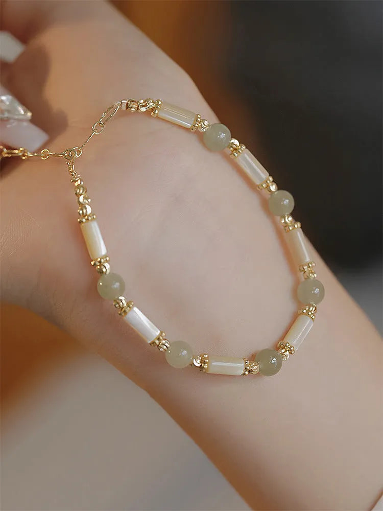 Women's bamboo bracelet with 6mm Hetian jade beads and bamboo joint decorative elements
