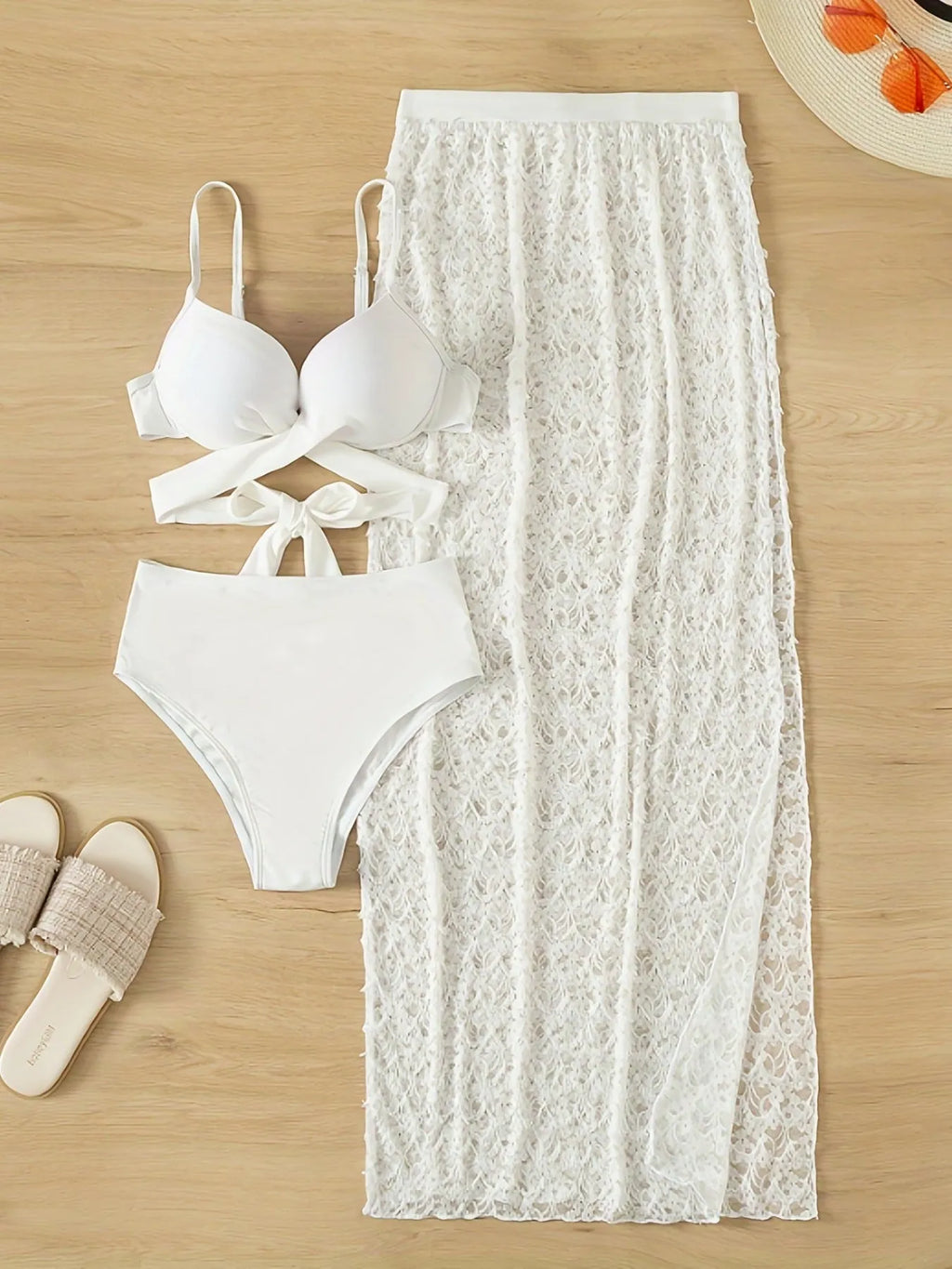 White three-piece nylon swimsuit set with a gathered long skirt, shown on a model for swimming.