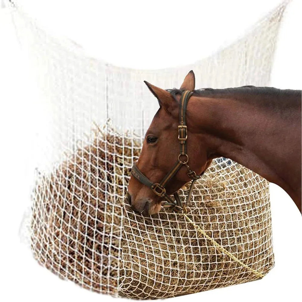 Black woven grid horse feeding bag hanging, showing size options for cattle, horses and sheep.