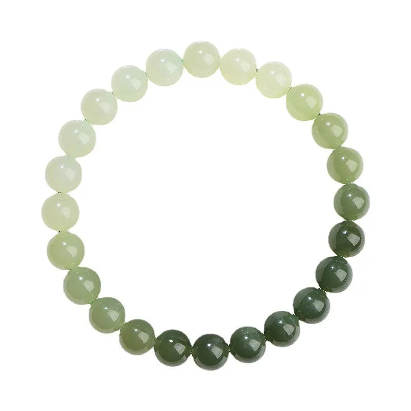 Natural gradient water Hetian jade bead bracelet showing round and barrel bead options on an adjustable string.