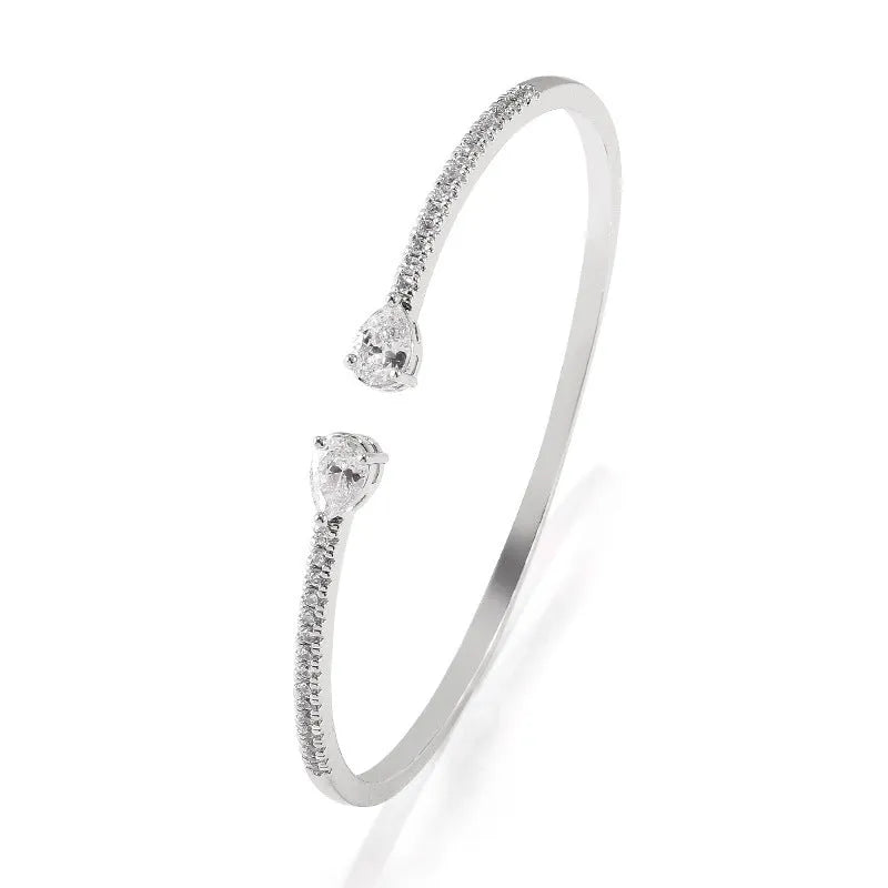 Multi-zircon personalised bracelet with inlaid stones on copper base in white and blue colour options
