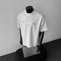 Men's black cotton short sleeve shirt with white letter print, loose fit pullover style
