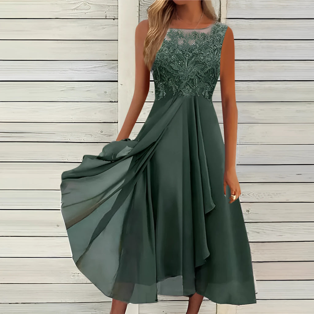 Women's sleeveless green chiffon dress with lace stitching and a mid-length skirt.