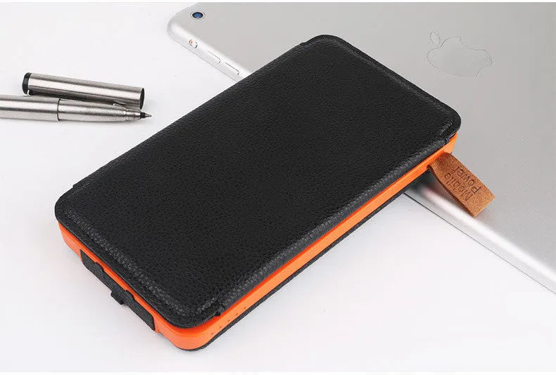 Outdoor solar phone charger with leather casing showing solar panel and LED light