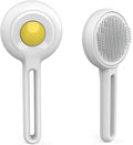 Yellow cat brush with release button and stainless steel bristles on a light background