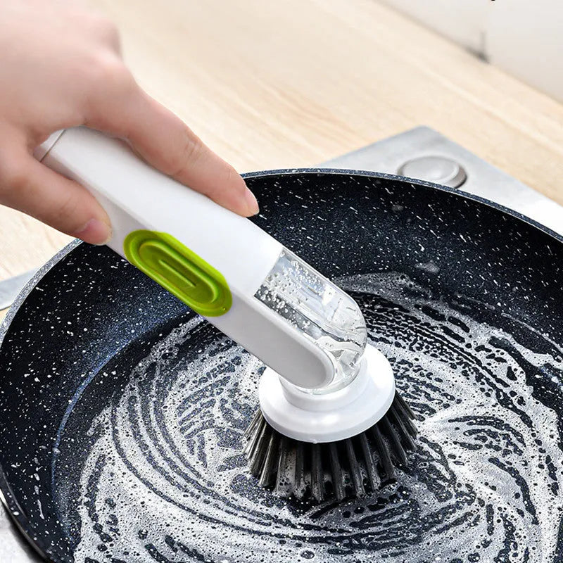 Long-handle kitchen cleaning brush with liquid dispenser and two brush heads in white and green colour